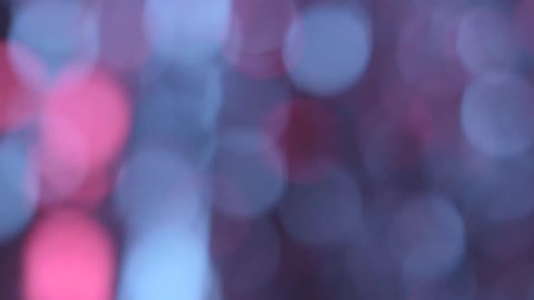 Moving Particles Colorful Blurred Bokeh Lights Background