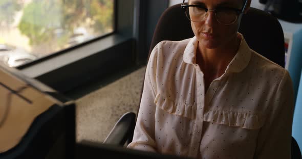 Businesswoman Working on Computer at Desk 4k