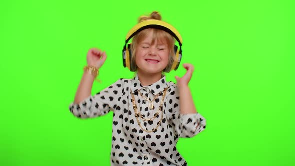 Attractive Blonde Child Kid Listening Music Via Headphones Dancing Disco Fooling Having Fun Party