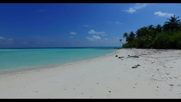 Aerial seascape of beautiful shore beach vacation by blue sea and white sandy background of a dayout