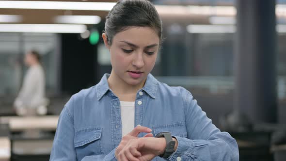 Beautiful Indian Woman Using Smart Watch