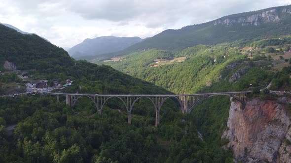 Long Road Bridge Over a Valley in the Mountains