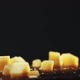 Cubes of Delicious Cheese Fall Down Onto Table on Black - VideoHive Item for Sale