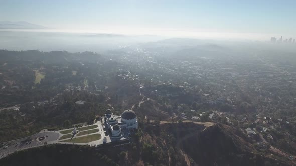 Drone ascending over Griffith Observatory, Los Angeles, USA