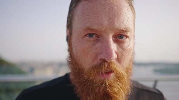 Portrait of Mature Bearded Man with Drops of Sweat on Face