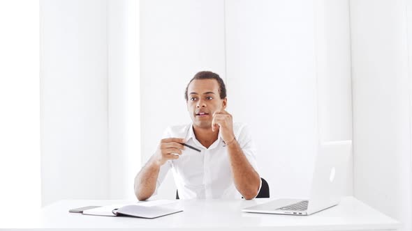 Young Businessman Thinking Smiling Rejoicing Clapping at Workplace Slow Motion