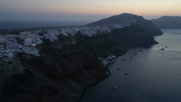 Aerial View Flying Over City of Oia on Santorini Greece