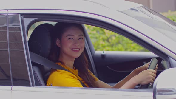 Beautiful attractive young woman smile in casual sitting in comfort car