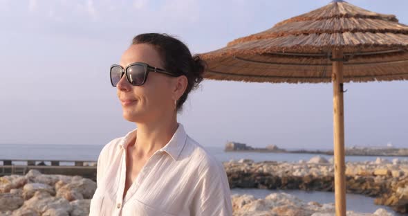 One Female Enjoy the Sunset on the Beach