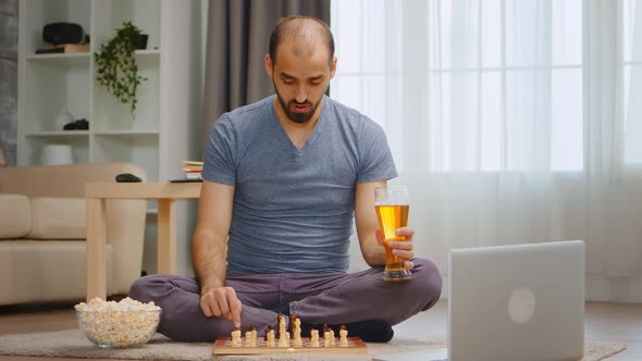 Man Playing Chess on Video Call