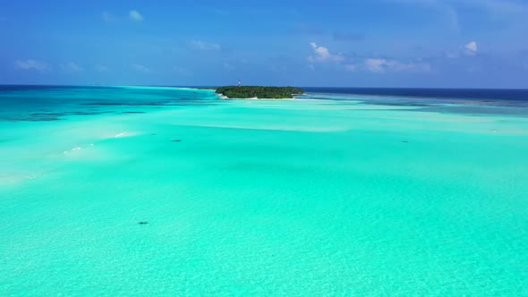 Aerial view nature of tranquil coast beach lifestyle by blue ocean with white sand background of jou