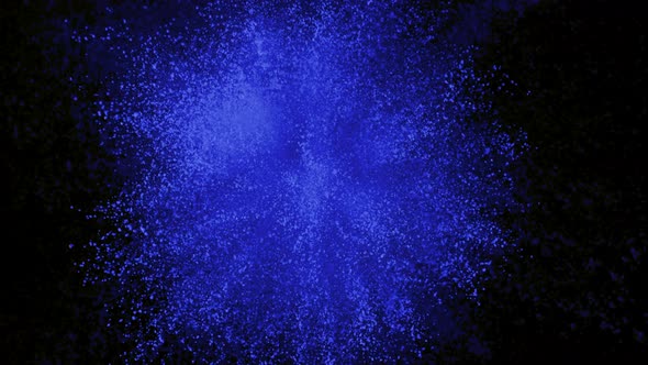 Blue powder exploding on black background in super slow motion, shot with Phantom Flex 4K alt