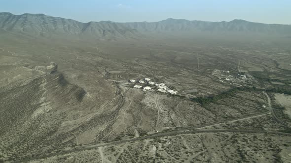 DRONE DAY CLOUDY NORTH COAHUILA MEXICO HOTEL TERMAS DE SAN JUAQUIN SEMI-DESERT MOUNTAIN LA AZUFROSA