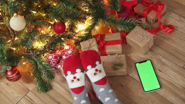 Christmas Background with Smartphone Green Screen Mockup Chromakey Funny Socks