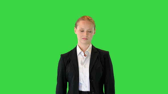 Young Business Woman Standing Doing Nothing on a Green Screen Chroma Key