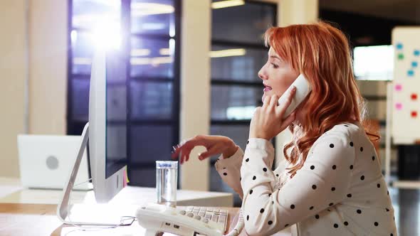 Businesswoman talking on phone