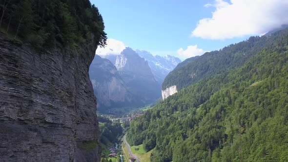 Aerial travel drone view of the Lauterbrunnen Valley, Switzerland.