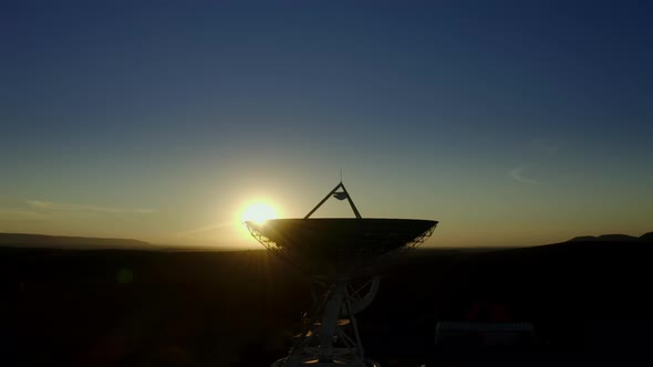 Aerial View of Telecommunications Antenna or Radio Telescope Satellite Dish on Sunset