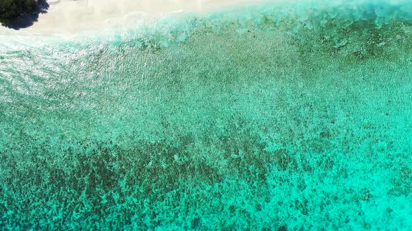 Luxury aerial abstract view of a white sand paradise beach and turquoise sea background in colorful 