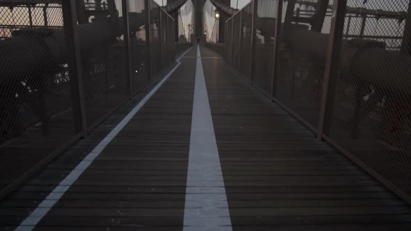 Empty Brooklyn Bridge with No People Early Morning at Sunrise in Beautiful Sunlight in Summer 