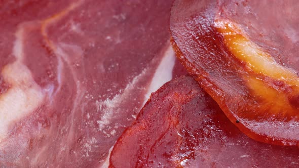 Sliced and seasoned air dried pork loin, extreme close up view in 4k. Macro shot, texture of air dri