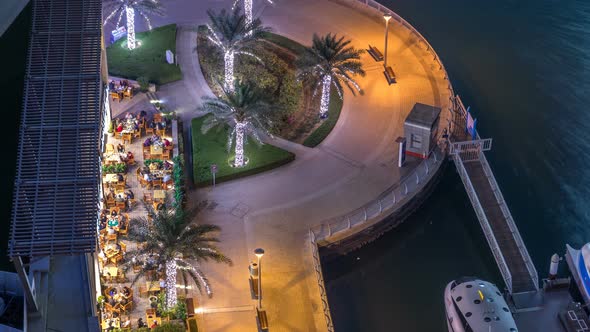 Modern Embankment Timelapse with Bar Cafe and Restaurant in Famous Dubai Marina