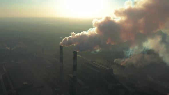 Smoking Factory Chimneys. Environmental Problem of Pollution of Environment and Air in Large Cities