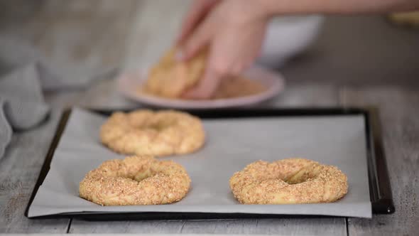 Woman Hands Cooking a Turkish Bagels Simit