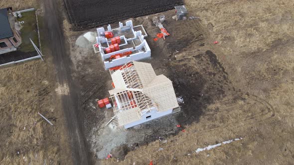 Aerial View of Unfinished Frame of Private House with Aerated Lightweight Concrete Walls and Wooden