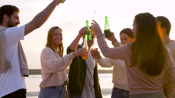 Friends Toasting Non Alcoholic Drinks on Beach