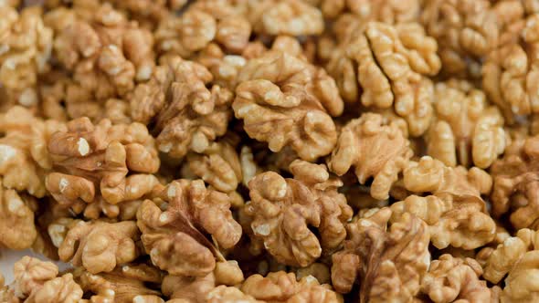 Looped Spinning Walnuts Without the Shell Closeup Full Frame Background