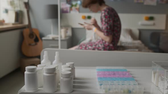 Pill Jars and Organizer in Hospital Ward