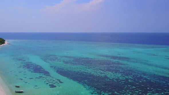 Drone aerial texture of island beach by blue ocean with sand background