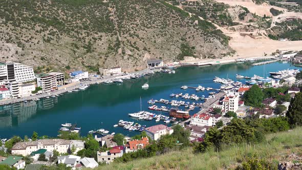 Panoramic View From Hill to Sea Bay with Yachts and Small Coastal Town in Mountain Area Ruines of