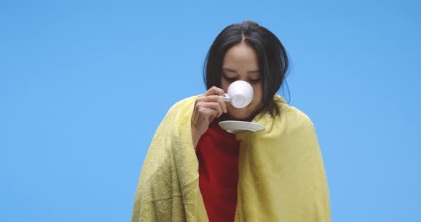 Sick Woman Drinking Tea