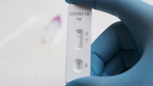 Demonstration of Negative Rapid Antigenic Covid19 Test By Doctor in Rubber Gloves