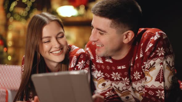 Woman With Long Hair Holds Digital Tablet and Emotionally Tells Funny Stories