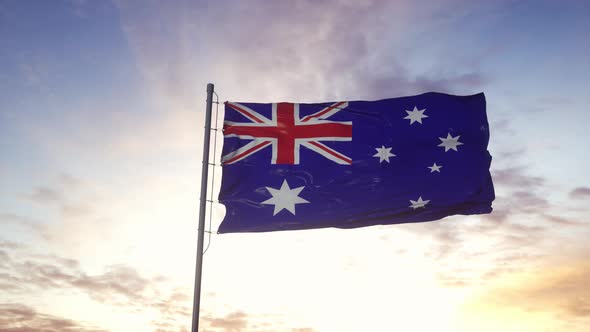 Australia Flag Waving in the Wind Dramatic Sky Background