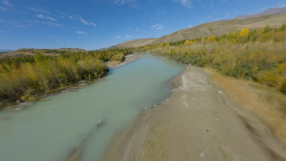 FPV Sports Drone Shot Majestic Nature Sunny Panorama Mountain River Meanders at Fresh Environment