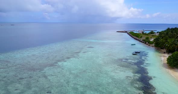 Natural above travel shot of a summer white paradise sand beach and turquoise sea background