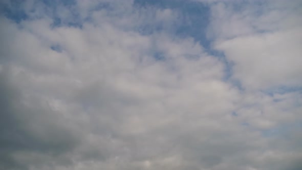 Clouds Move Smoothly in the Blue Sky. Timelapse