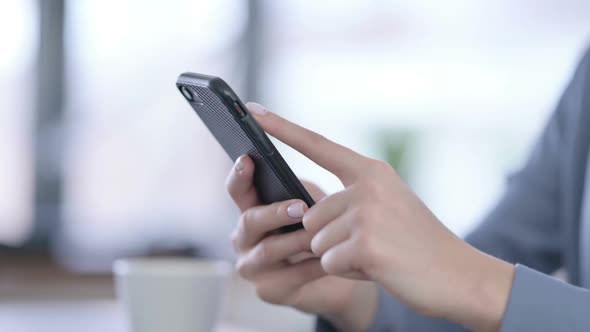 Close Up of Hands of Female Using Smartphone