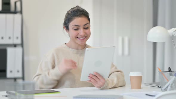 Indian Woman Talking on Video Chat on Tablet