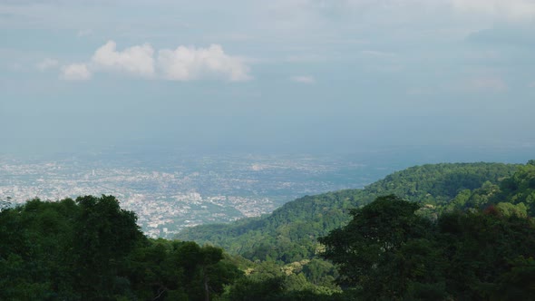 4K Cinematic landscape footage of the city of Chiang Mai, North Thailand from the top of Doi Pui on