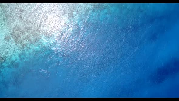 Aerial drone texture of exotic sea view beach trip by blue sea with white sand background of journey