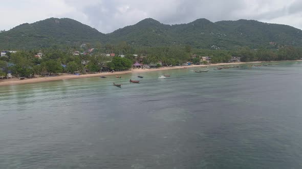 Thailand Beach with many Boats