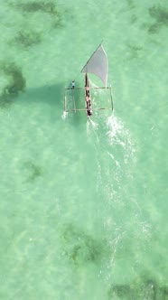 Vertical Video Boats in the Ocean Near the Coast of Zanzibar Tanzania