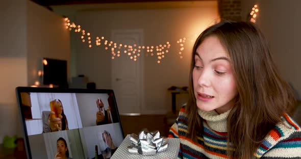 Woman Celebrating Christmas with Online Friends