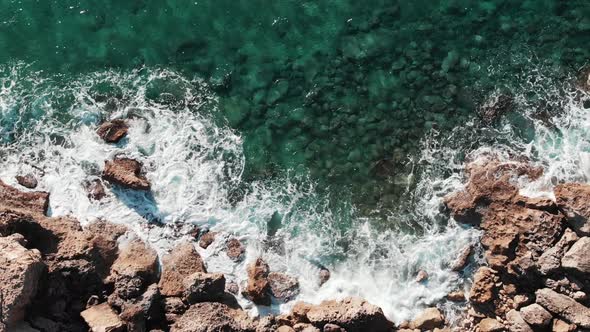 White Sea Waves Hitting Rocky Seashore Splashing White Foam