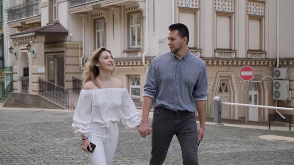 Young Couple Walking Street